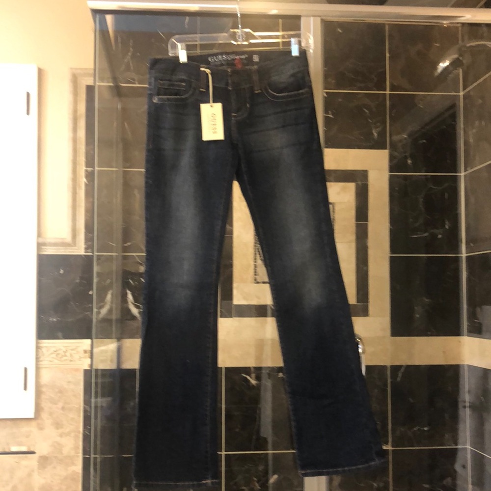 Guess jeans, size 27, inseam 34 inches, new with tags.